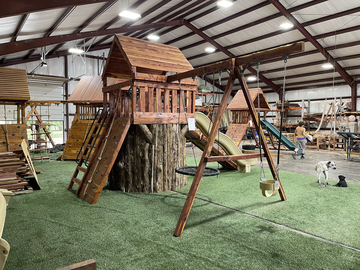 Ozark playsets being pre-assembled in the Missouri shop
