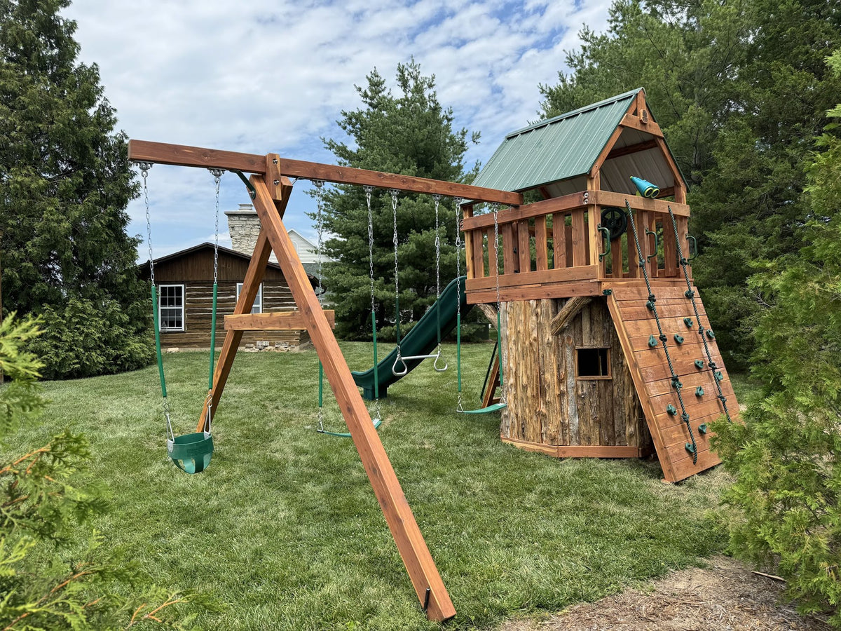 Ozark playset with swing beam in a wooded backyard